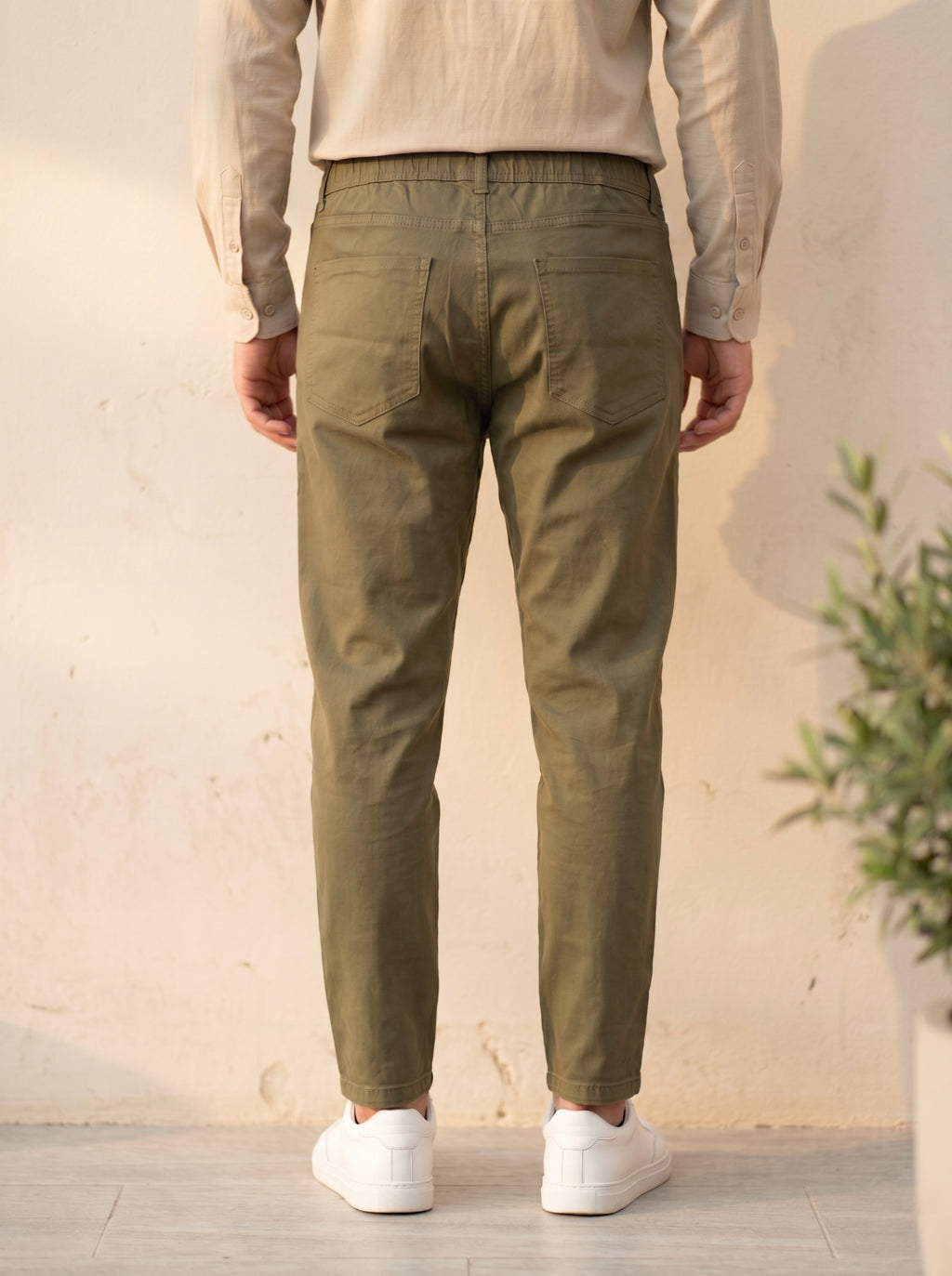 Snipes carrot fit denim jeans showing a mid-rise style with classic five-pocket design and light blue wash.