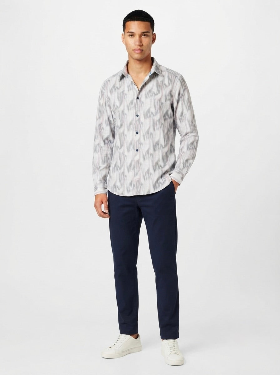 Snipes men's abstract print full sleeve casual shirt with vibrant design, button-up front, and collar, perfect for relaxed style.