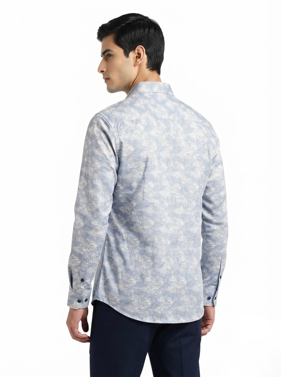 Men’s tropical leaf printed full sleeve shirt by Snipes, featuring vibrant green and yellow leaf patterns on lightweight fabric.