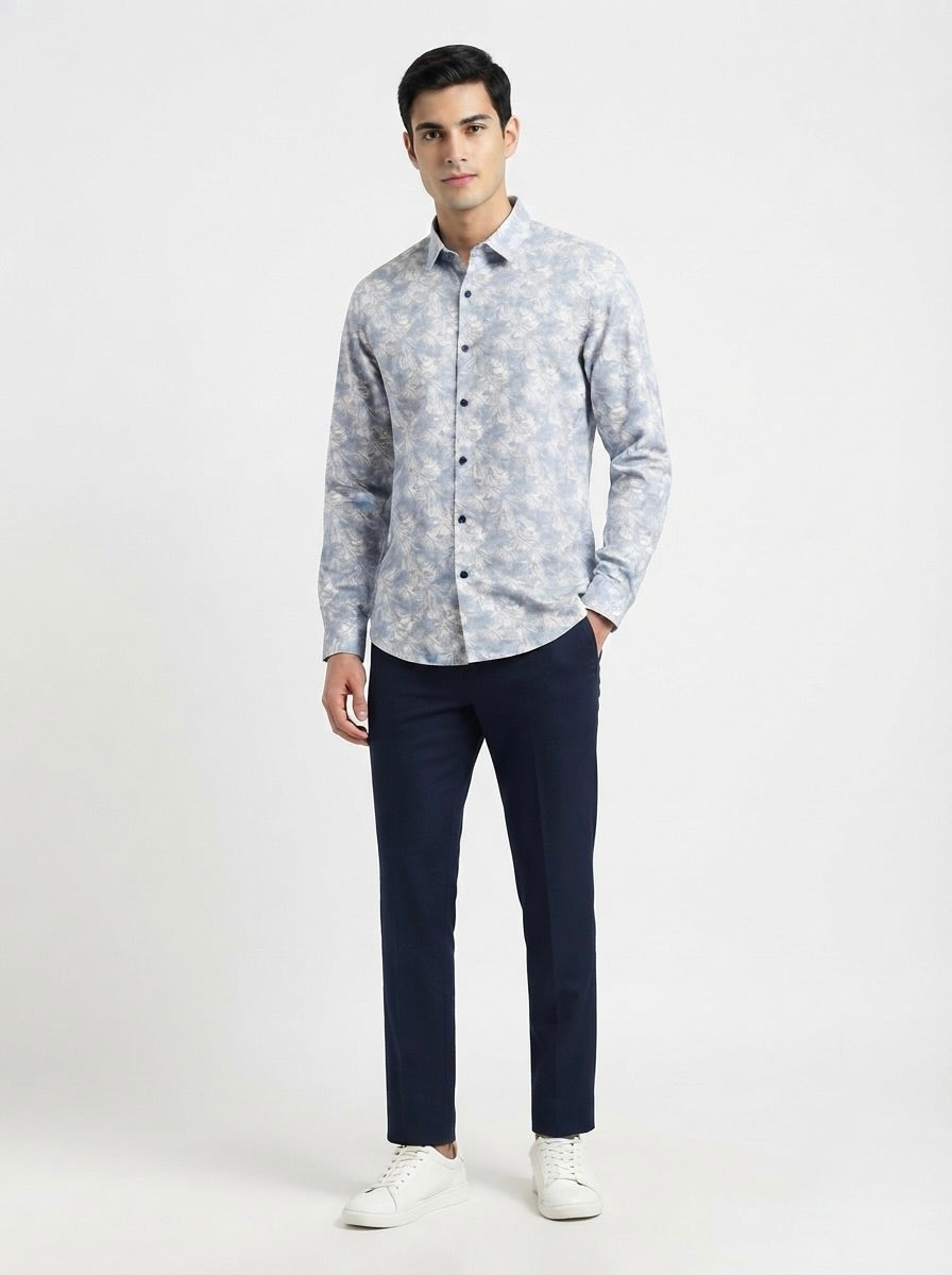 Men’s tropical leaf printed full sleeve shirt by Snipes, featuring vibrant green foliage design on lightweight fabric.