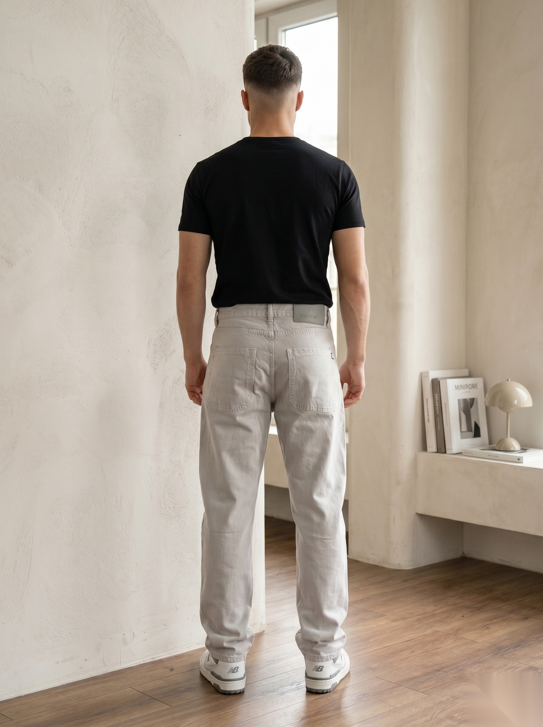 Snipes baggy fit denim jeans with relaxed style and classic blue wash, displayed on a hanger.