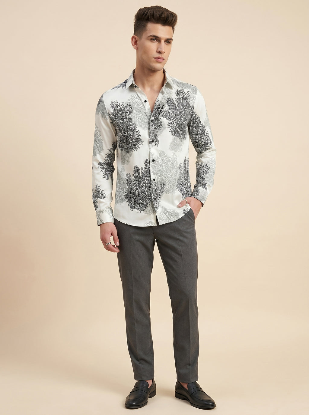 Snipes printed shirt with colorful graphic design, long sleeves, and button-up front, displayed on a mannequin.