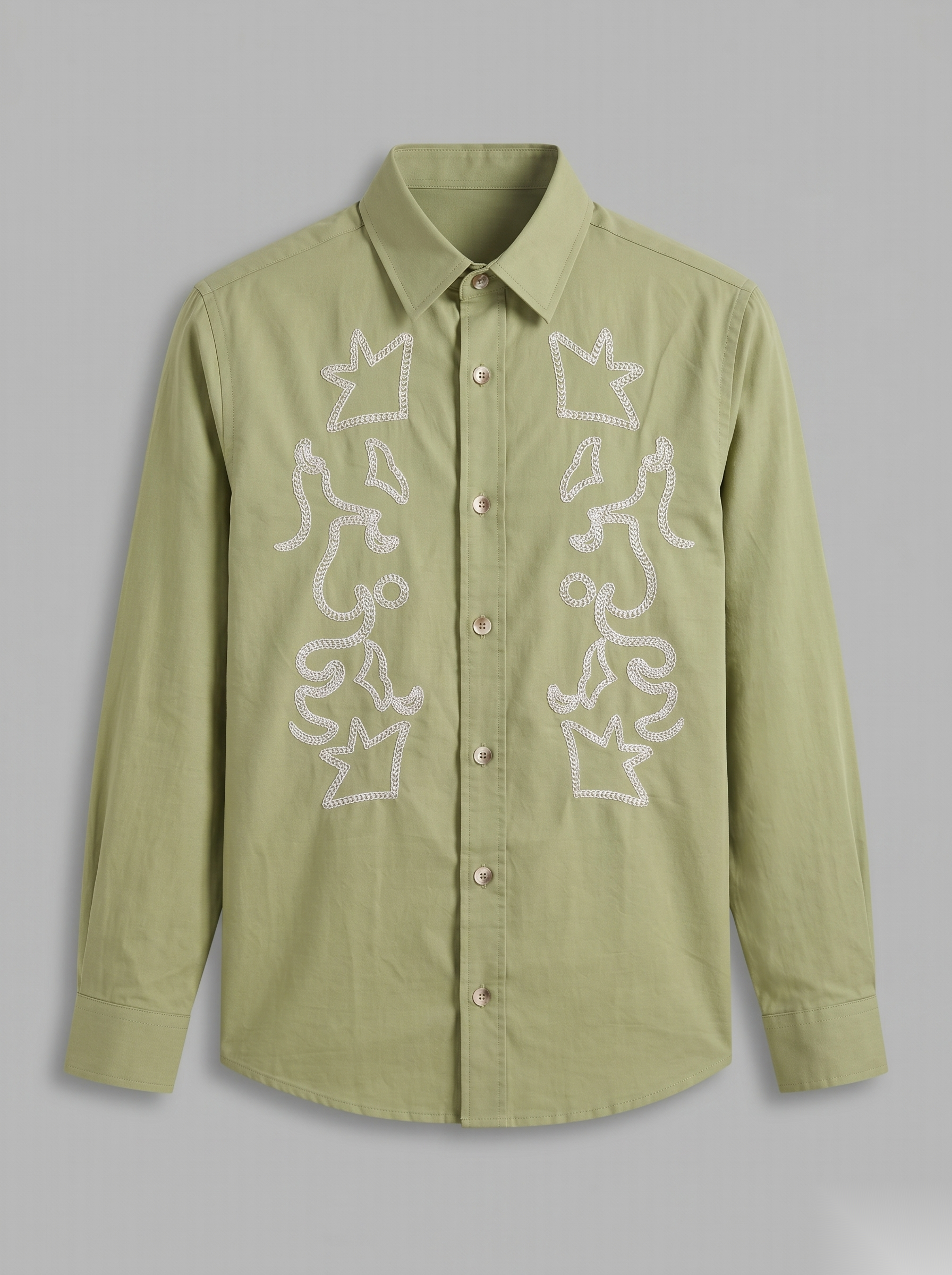 Snipes embroidery full-sleeve shirt with intricate stitched design, shown in a close-up view.