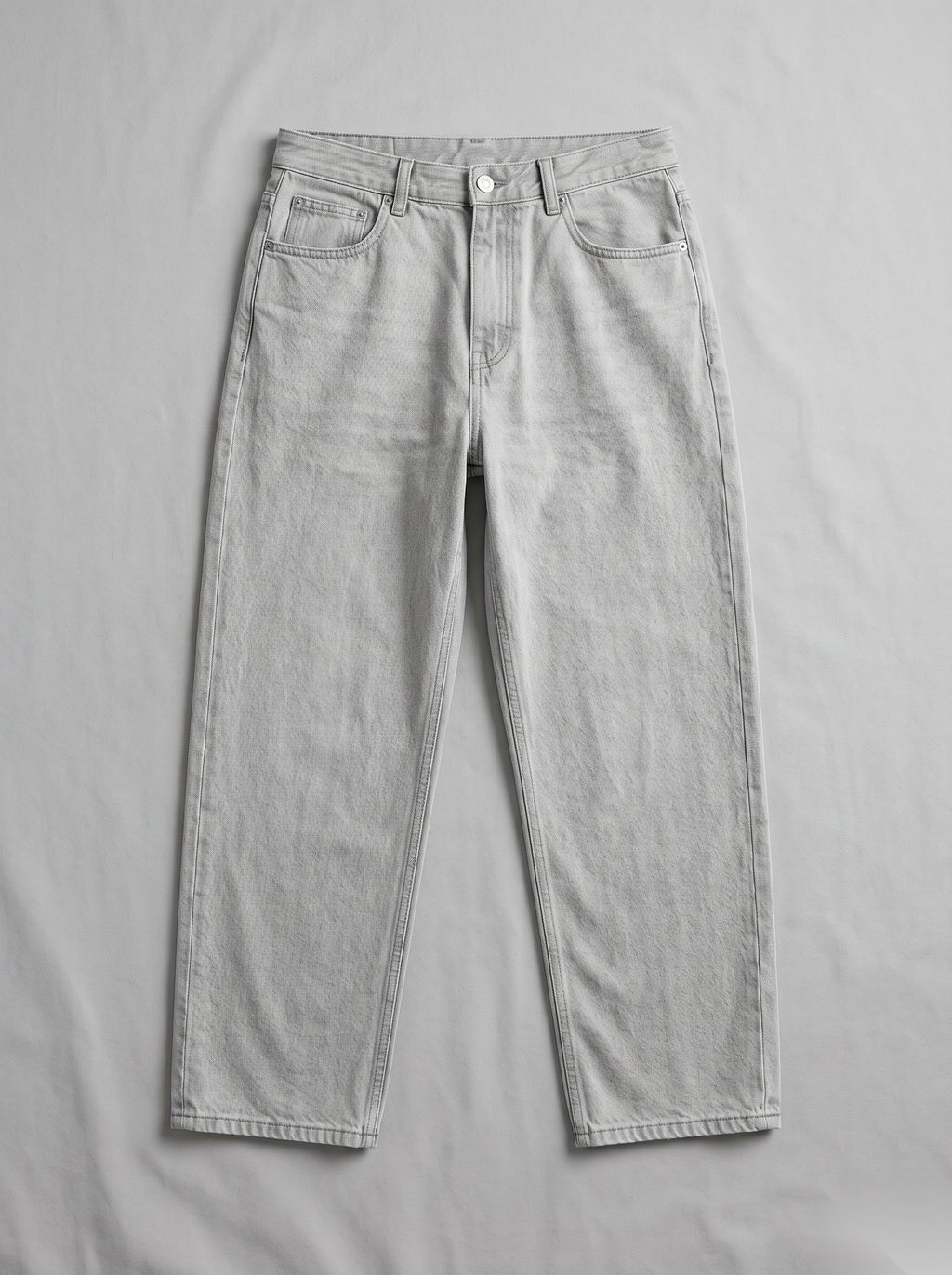 Snipes baggy fit denim jeans with relaxed style, shown in a front view featuring classic five-pocket design and light wash.