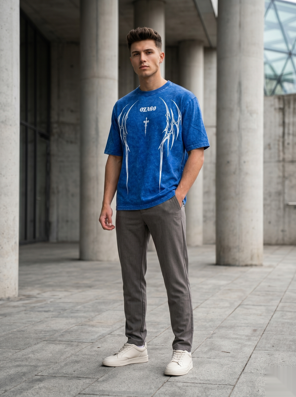 Oversized acid wash graphic T-shirt by Snipes showing a relaxed fit with bold graphic design on soft fabric.