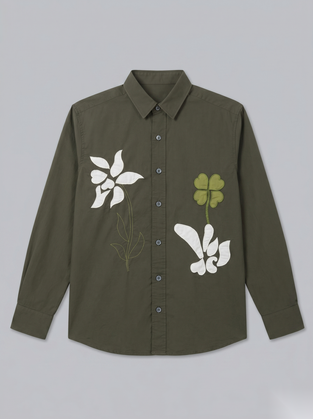Snipes embroidered full-sleeve shirt featuring detailed embroidery and a classic fit, shown in a close-up view.