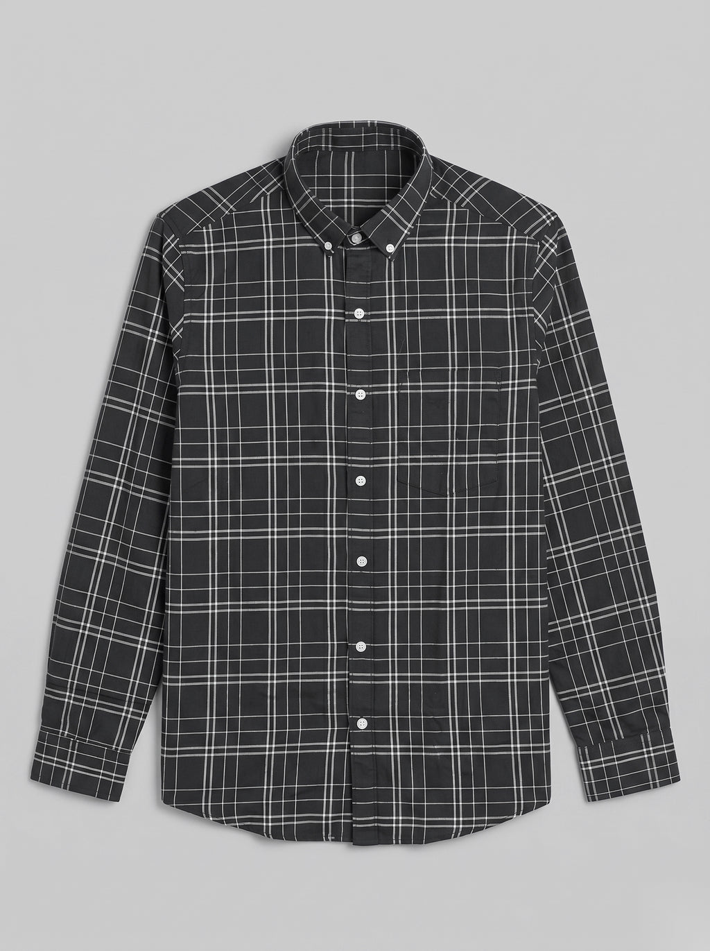 Snipes checked shirt with blue and white pattern, long sleeves, and button front, displayed on a hanger.