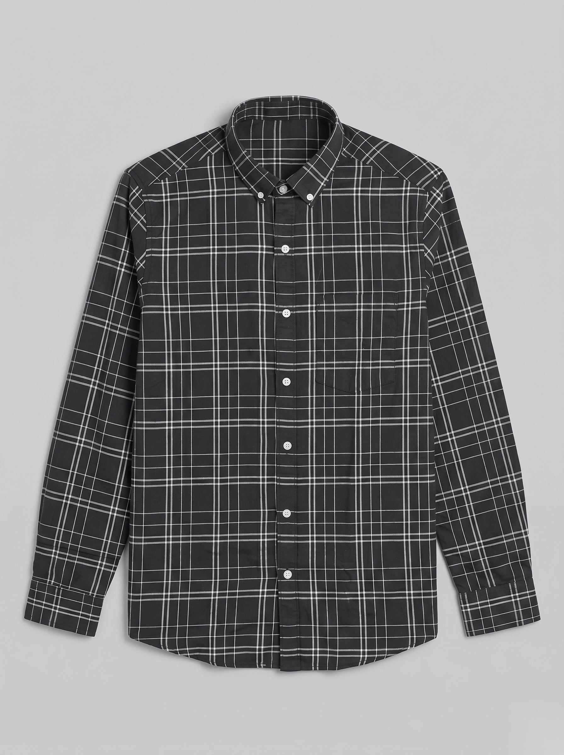 Snipes checked shirt with blue and white pattern, long sleeves, and button front, displayed on a hanger.