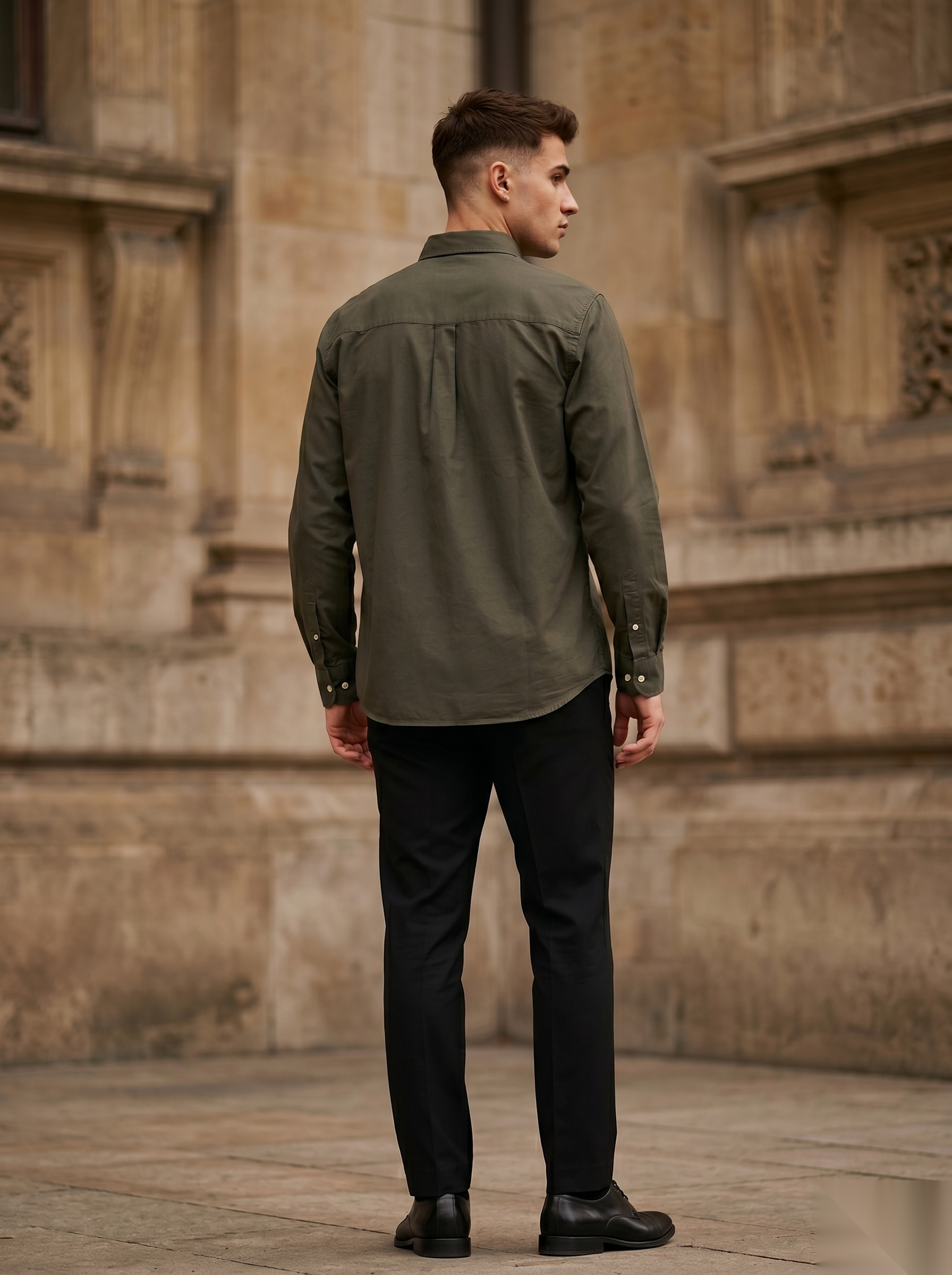 Snipes embroidery full-sleeve shirt featuring detailed stitched patterns and a classic collar, displayed on a hanger.
