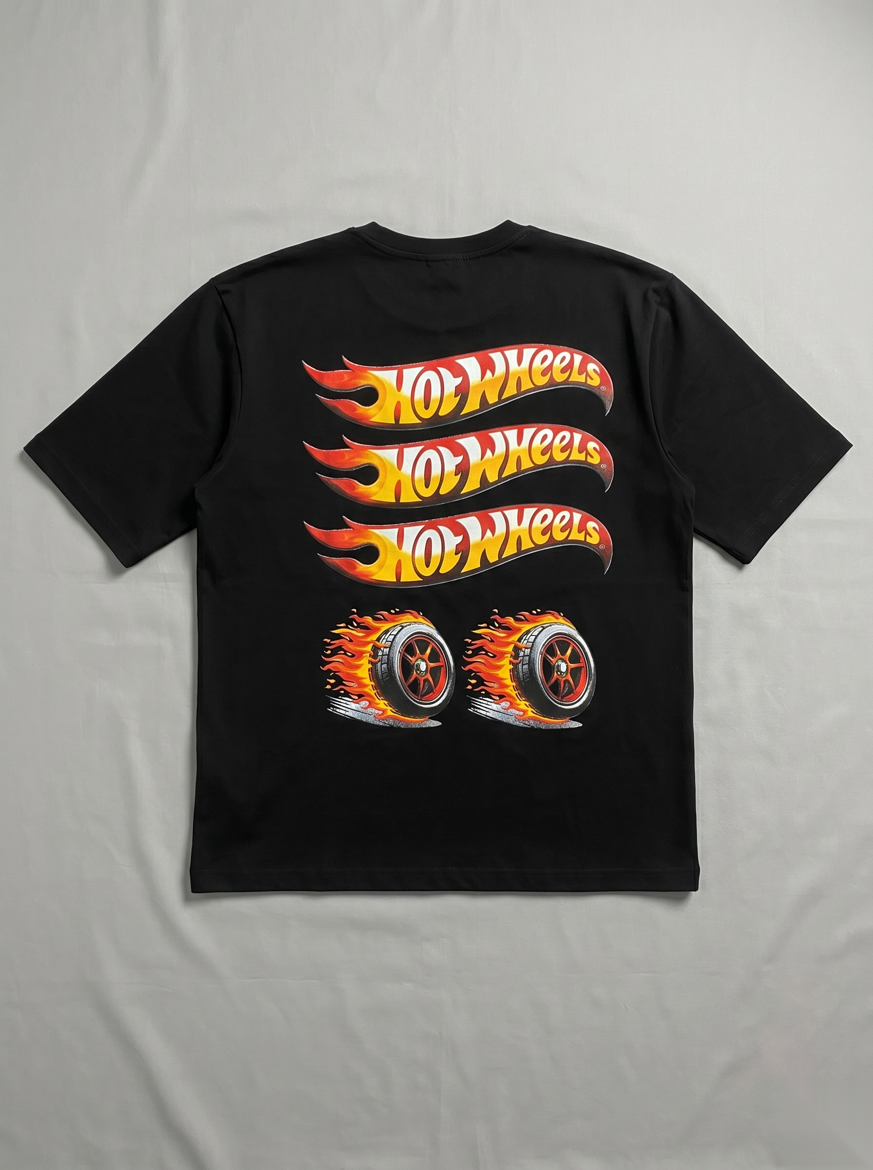 Snipes oversized backprint T-shirt featuring a bold graphic design in a large fit, casual streetwear style.