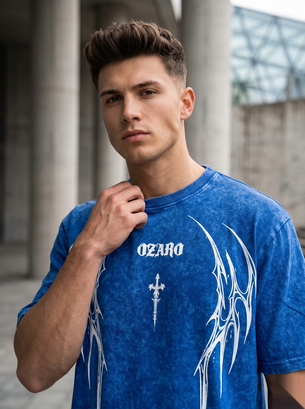 Snipes oversized acid wash graphic T-shirt featuring bold print and relaxed fit, displayed on a hanger.