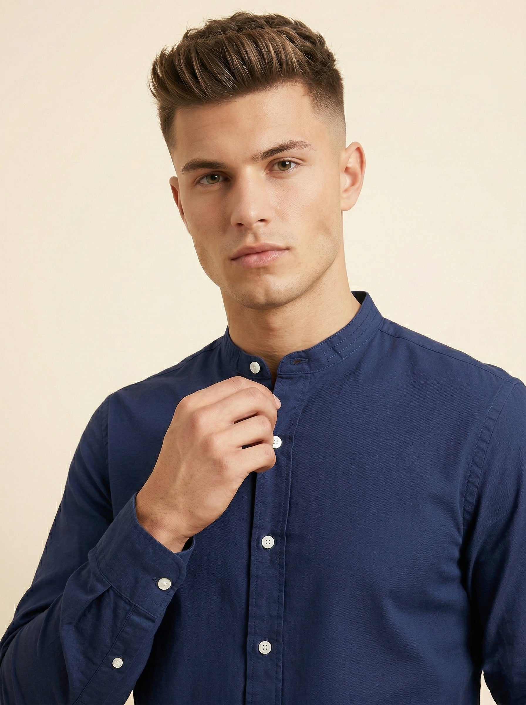 Snipes linen mandarin collar shirt displayed on a hanger, featuring a lightweight fabric and stylish design.