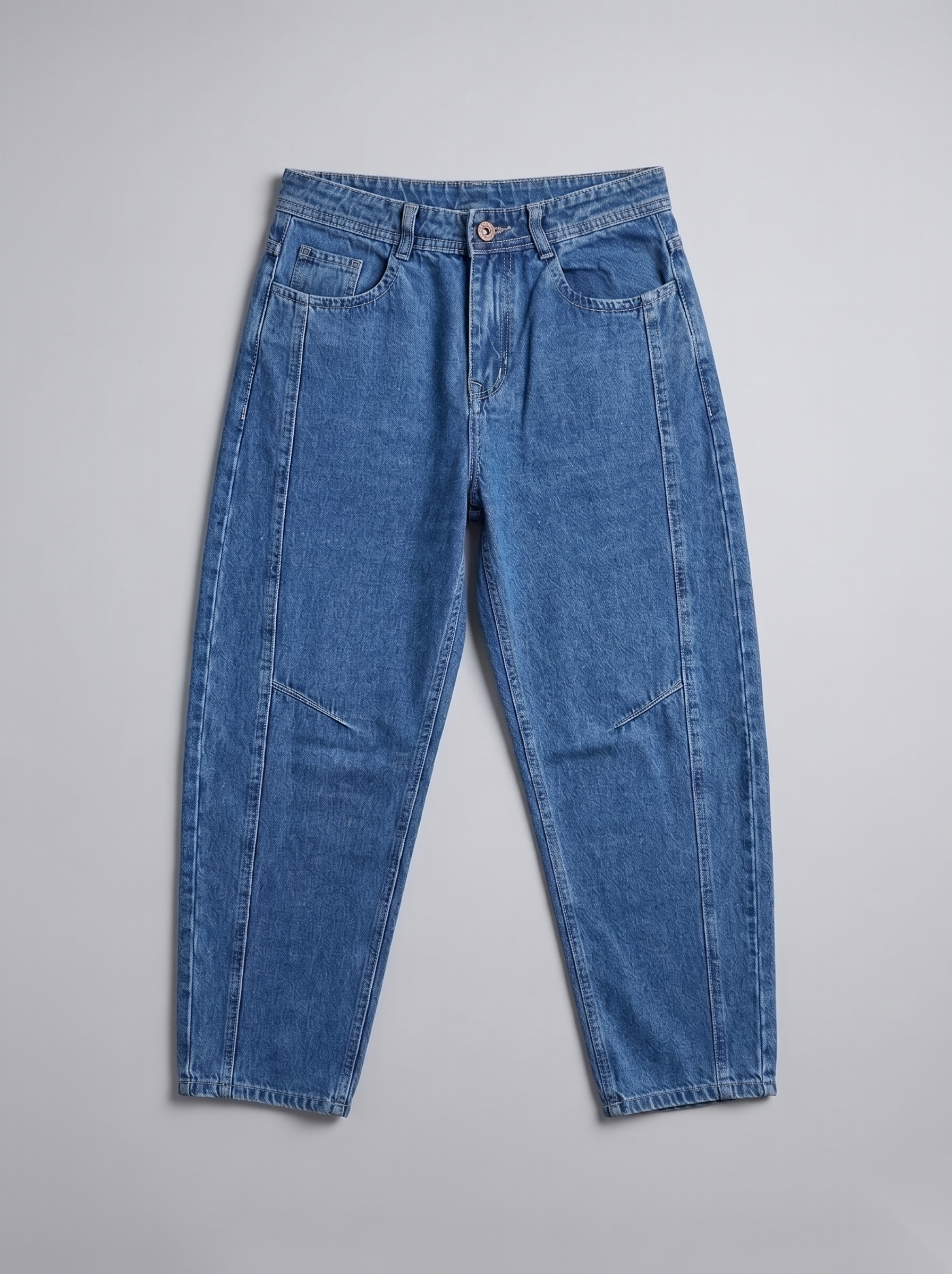 Snipes Barrel Fit denim jeans showing classic blue color and relaxed fit with visible stitching and pocket details.