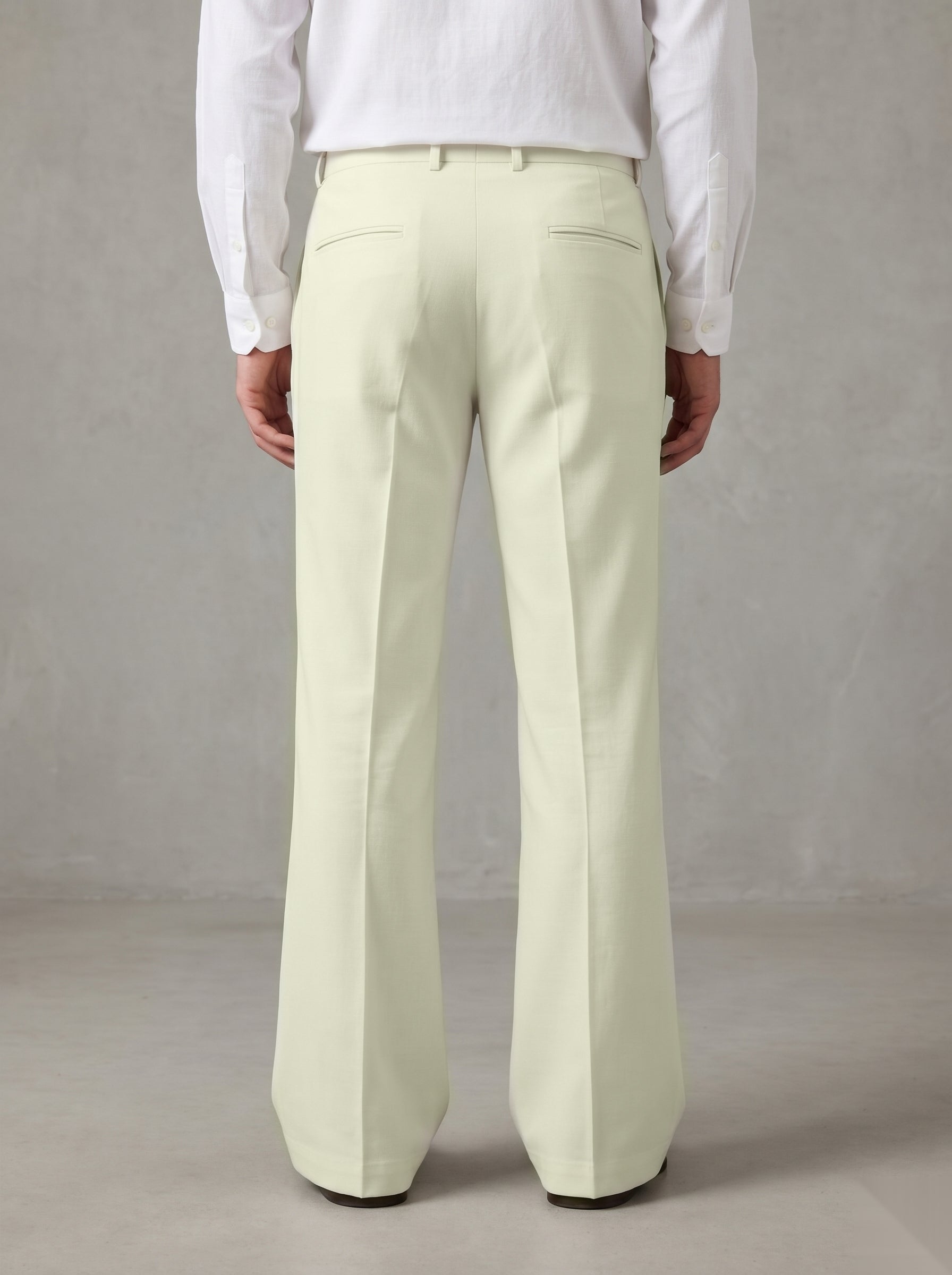 Snipes formal bootcut pants in dark fabric, styled with a tailored fit and classic design for professional or dressy occasions.