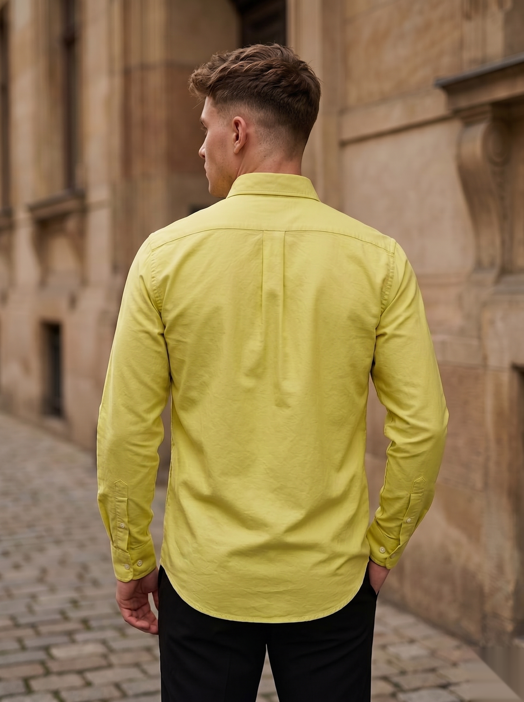 Snipes Oxford shirt with classic collar and button-up design, shown in a neutral color on a plain background.