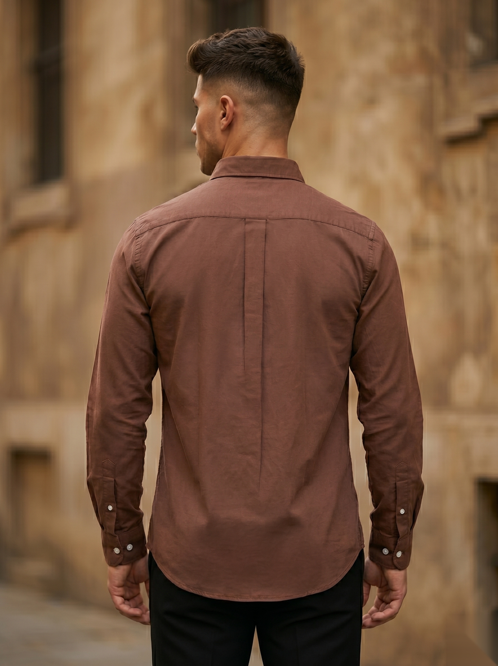 Snipes men's oxford shirt in light blue with a classic collar and button front, displayed on a hanger.