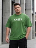 Black oversized Snipes T-shirt with bold backprint, relaxed fit, and casual style, featuring prominent graphic design on the back.