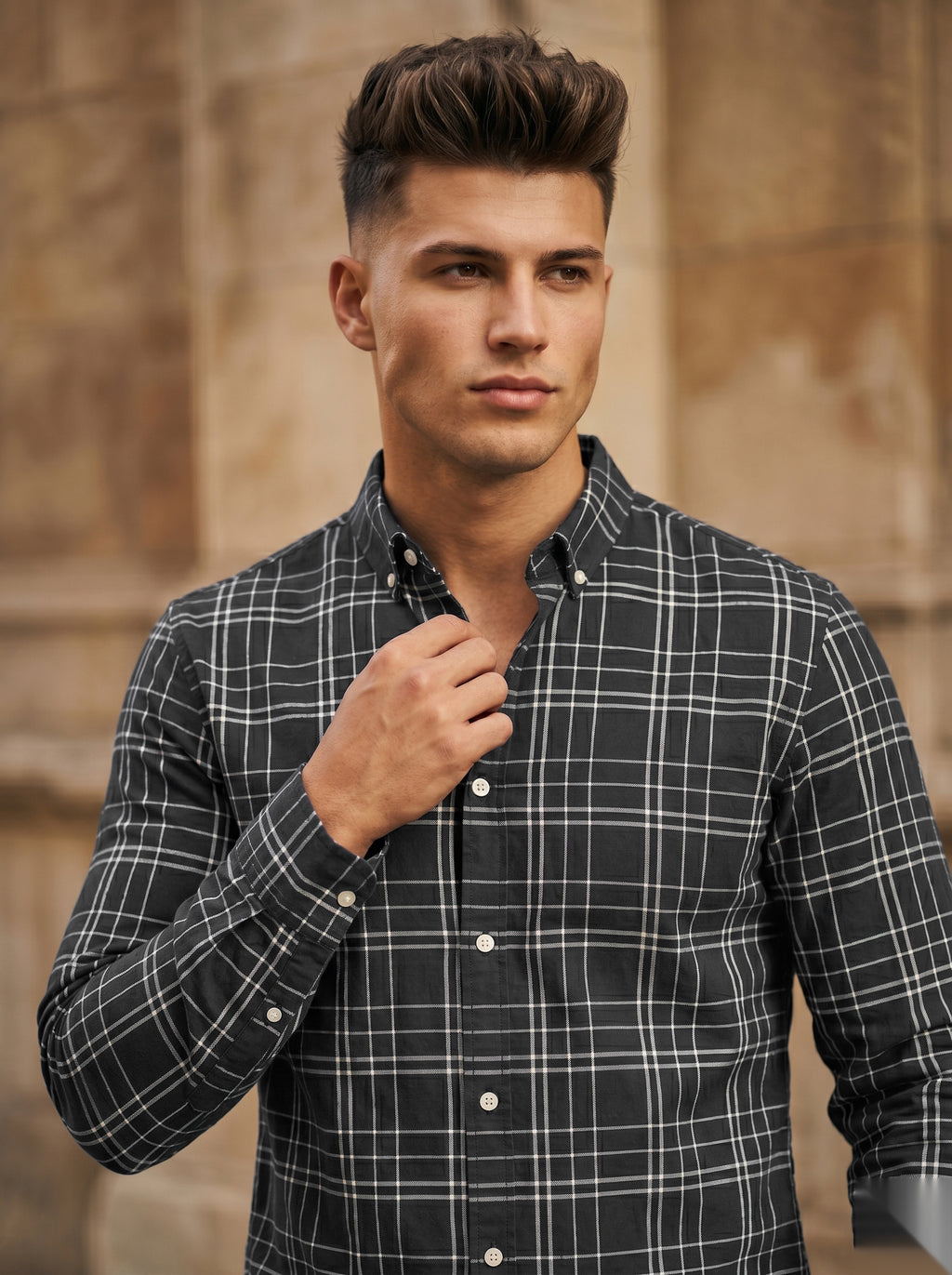 Snipes checked shirt with a classic plaid pattern, featuring a button-down collar and long sleeves, displayed flat on a white background.