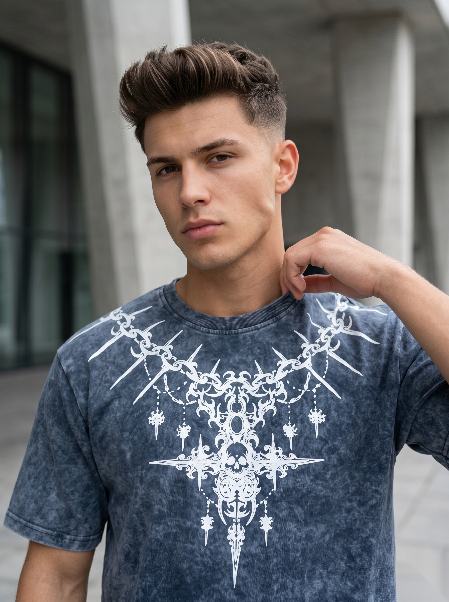 Oversized acid wash graphic T-shirt from Snipes with bold printed design and relaxed fit, showcasing a casual streetwear style.
