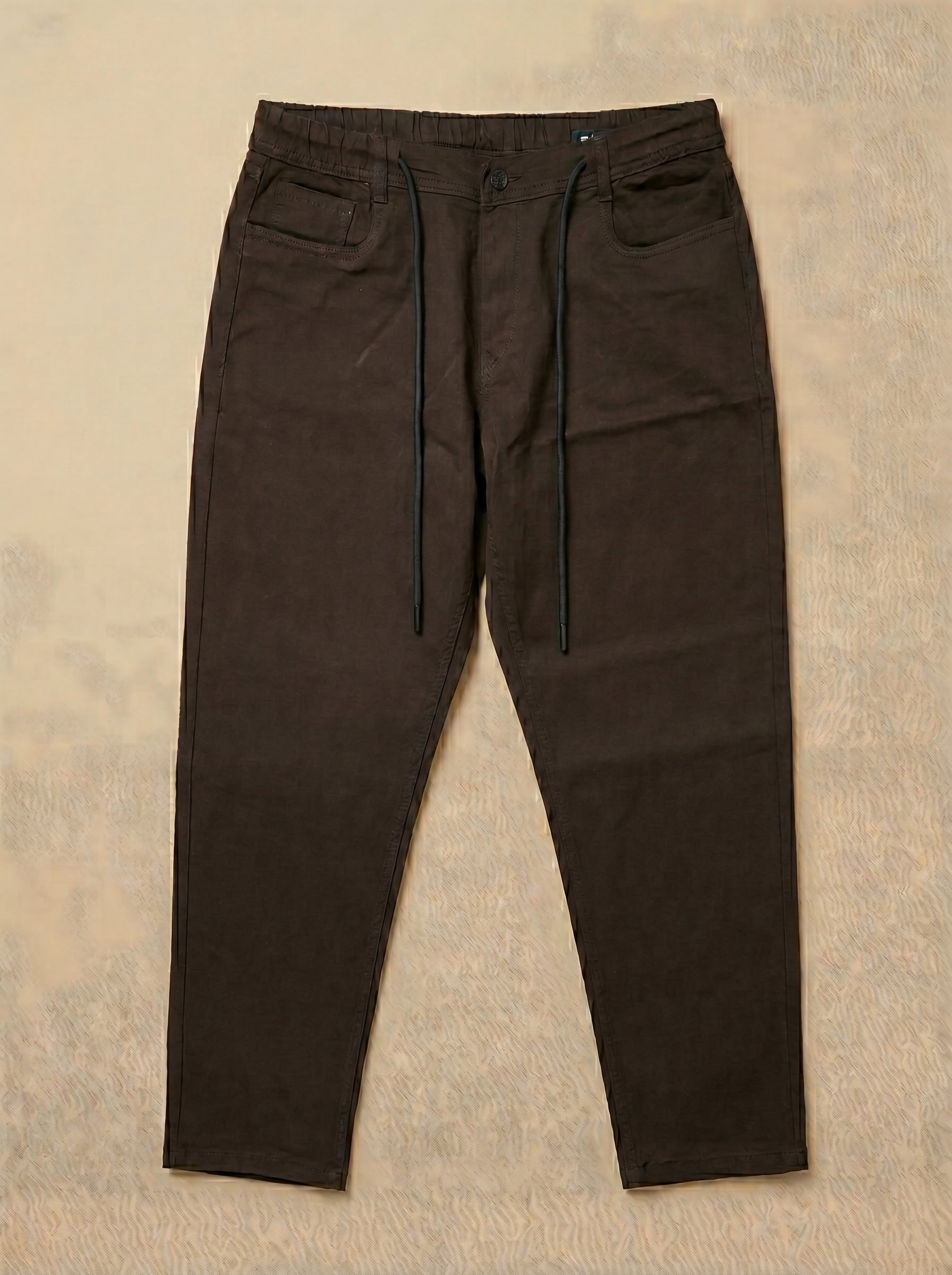 Snipes carrot fit denim jeans displayed on a model, showcasing stylish casual denim with a tapered fit.