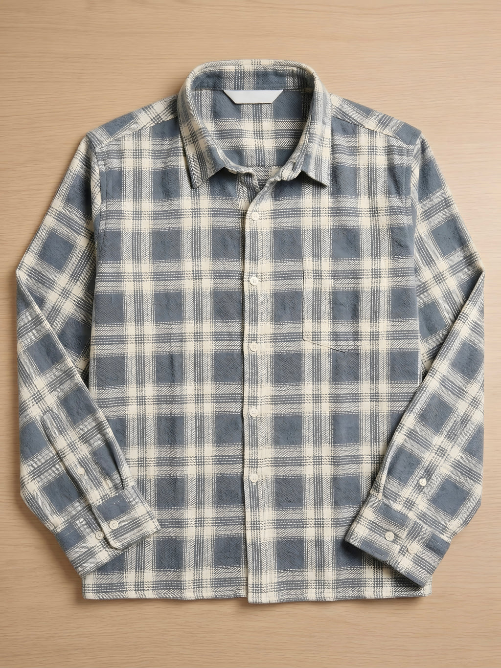 Snipes premium checked shirt with a classic plaid pattern, featuring button-up front and collar, shown on a hanger.