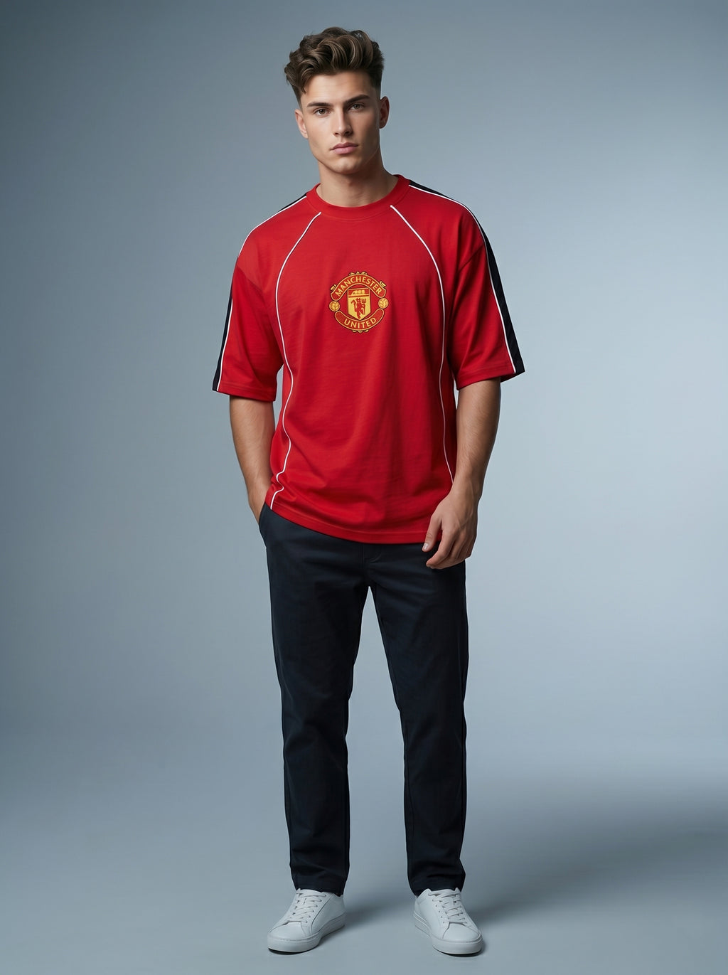 Snipes FB oversized T-shirt in black with relaxed fit, short sleeves, and crew neckline displayed on a hanger.