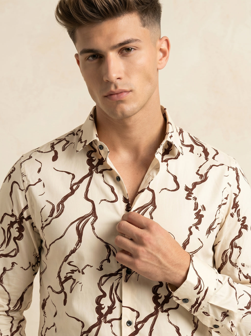 Snipes printed shirt with colorful graphic design, long sleeves, and collared neckline, displayed on a hanger.
