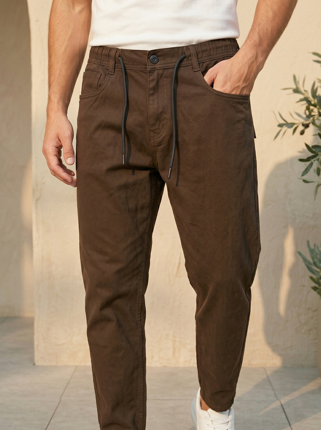 Snipes carrot fit denim jeans shown in the image, featuring a stylish slim design with classic blue denim fabric.