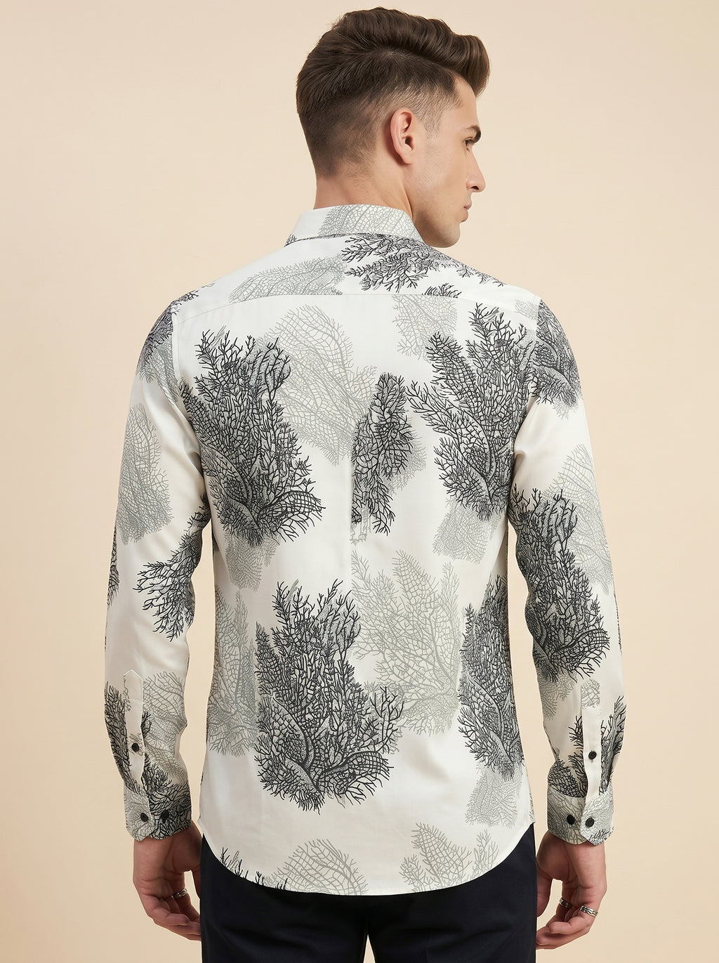 Printed Snipes shirt featuring bold, colorful patterns on lightweight fabric, displayed flat on a white background.