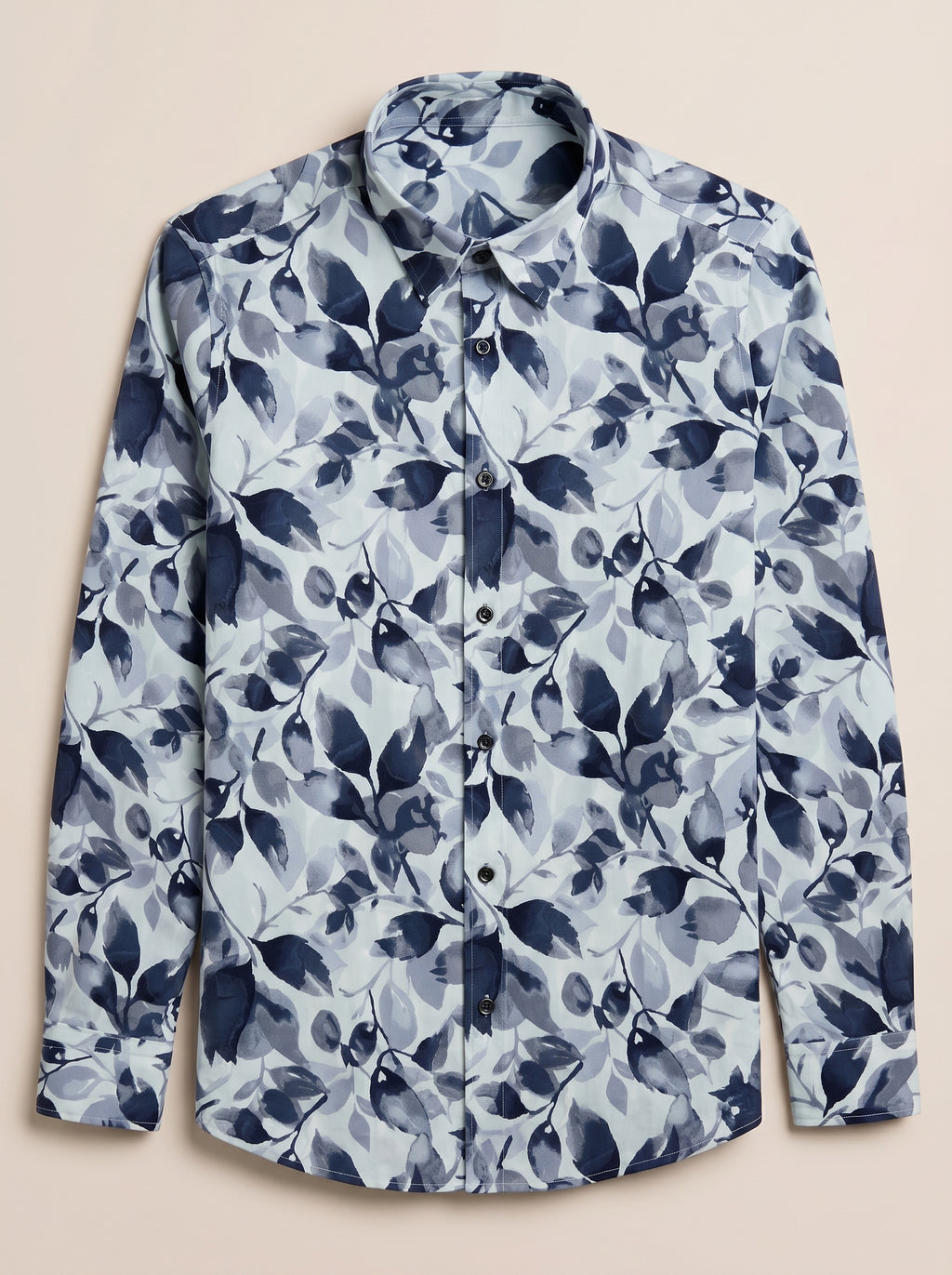 Snipes printed shirt featuring bold colorful patterns, long sleeves, and a casual fit, displayed on a mannequin.