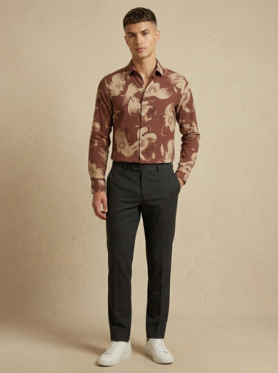 Snipes printed shirt featuring colorful graphic design, long sleeves, and classic collar on soft fabric.
