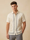 Snipes embroidery print shirt with long sleeves, featuring detailed embroidery design in a casual style.