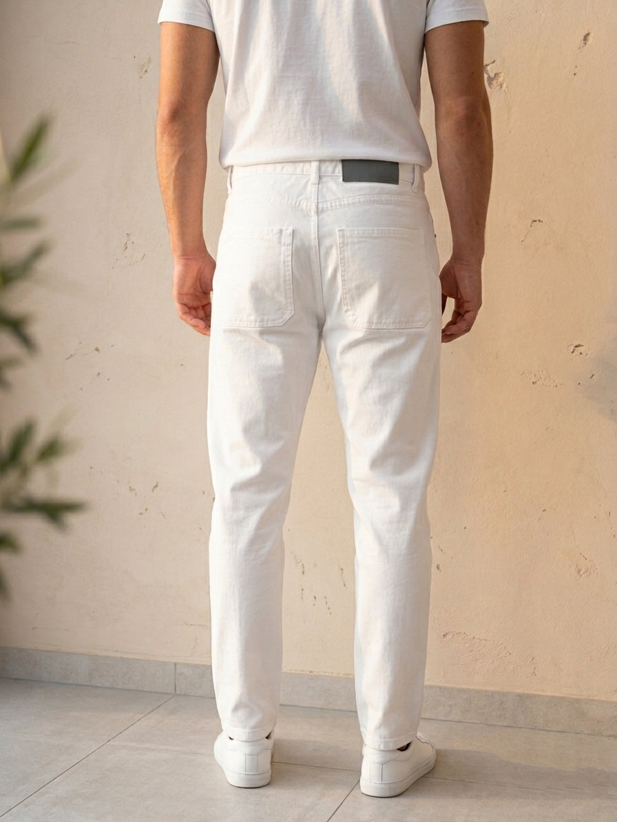 Snipes mom fit denim jeans displayed on a hanger, showcasing classic blue jeans with a relaxed fit and stylish design.
