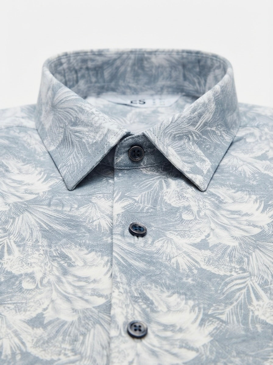 Men’s tropical leaf printed full sleeve shirt by Snipes, featuring vibrant green leaf patterns on lightweight fabric.