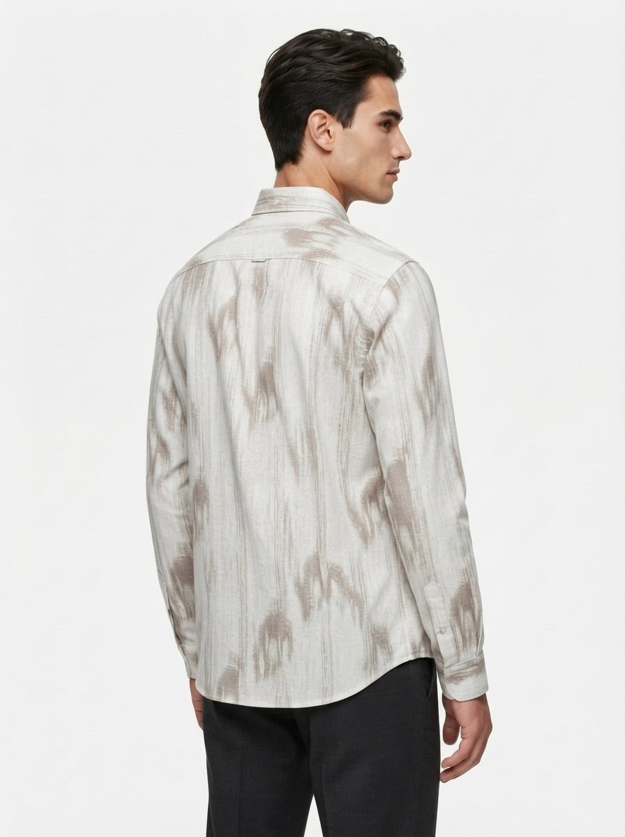 Men’s abstract brushstroke print full sleeve shirt by Snipes, featuring colorful artistic pattern and button front design.