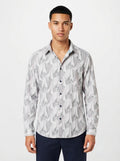 Men’s abstract print full sleeve casual shirt by Snipes, featuring a colorful artistic design and button-up front.