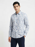 Men’s tropical leaf printed full sleeve shirt by Snipes featuring vibrant green and yellow leaf patterns on lightweight fabric.