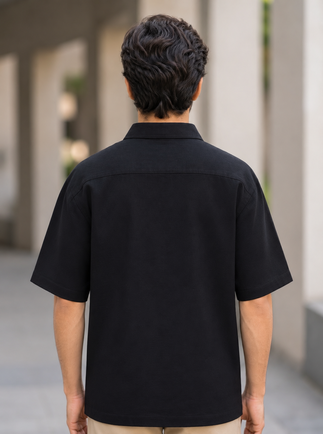 Snipes men's boxy fit black shirt, back view with embroidered detail