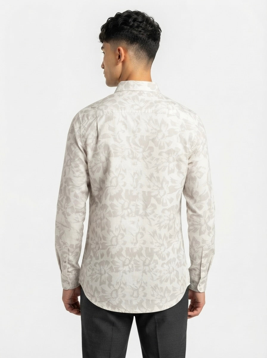 Men’s floral print full sleeve shirt by Snipes, featuring colorful floral pattern and button-up design on a casual shirt.