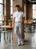 Snipes MOM Fit Jeans showing classic denim with a high-waisted, relaxed fit and stylish five-pocket design.