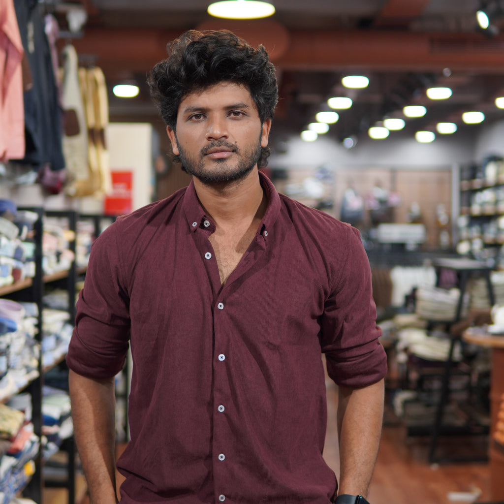 Snipes premium corduroy shirt displayed on a hanger, showcasing its rich texture and stylish design.
