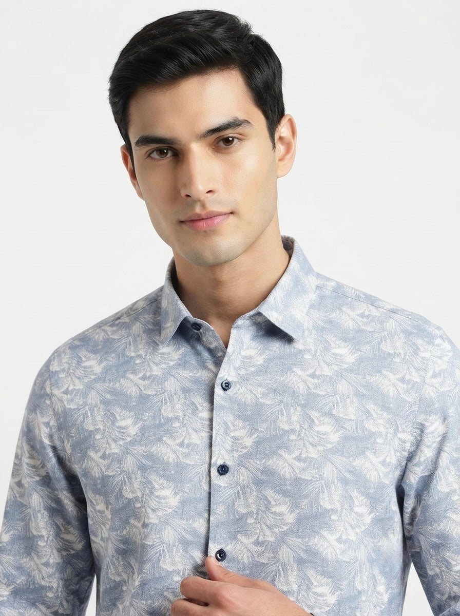 Men’s tropical leaf printed full sleeve shirt by Snipes, showcasing vibrant green leaf patterns on lightweight fabric.