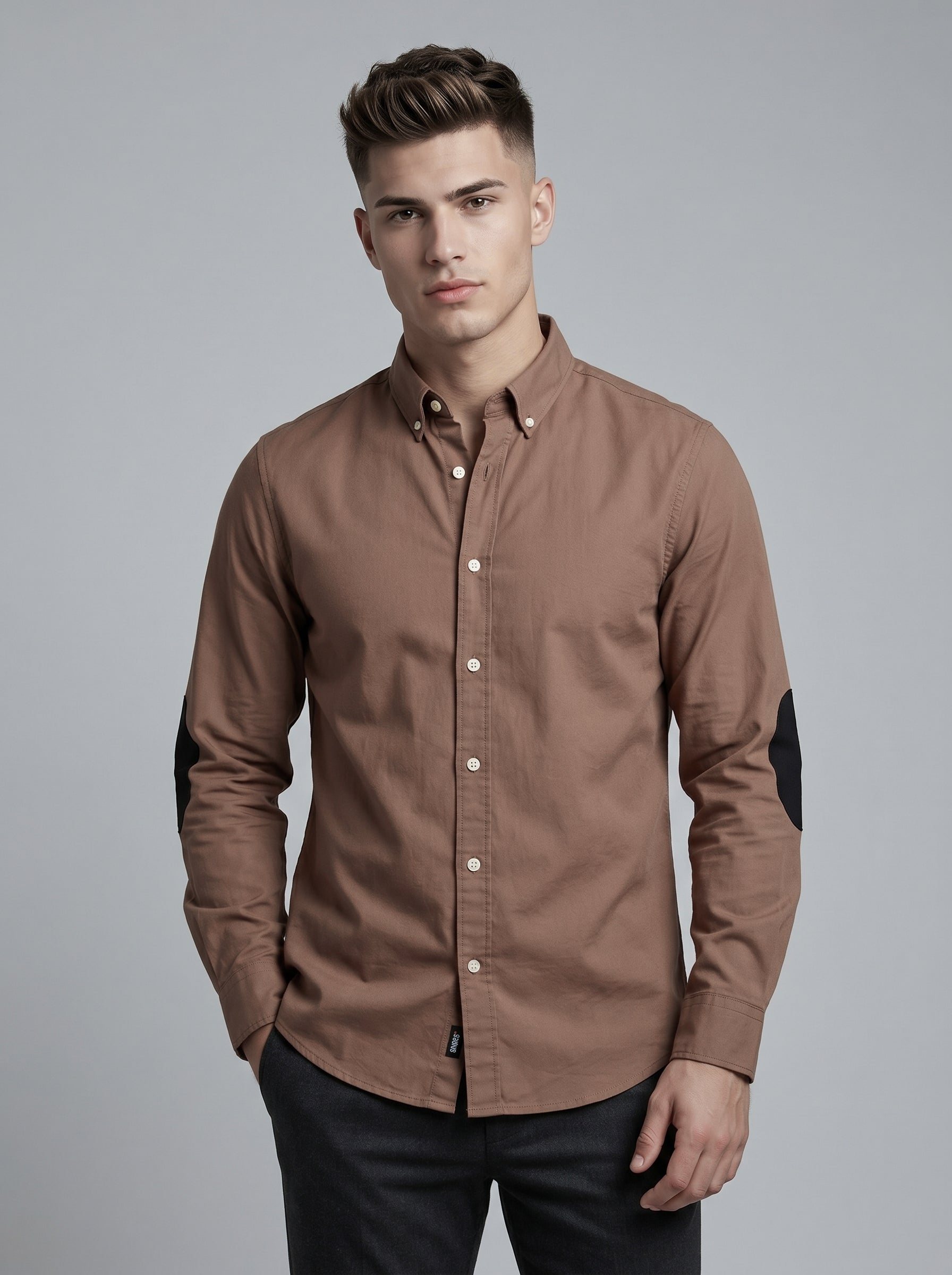Snipes elbow patch shirt featuring a stylish design with contrasting patches on the elbows, displayed on a plain background.