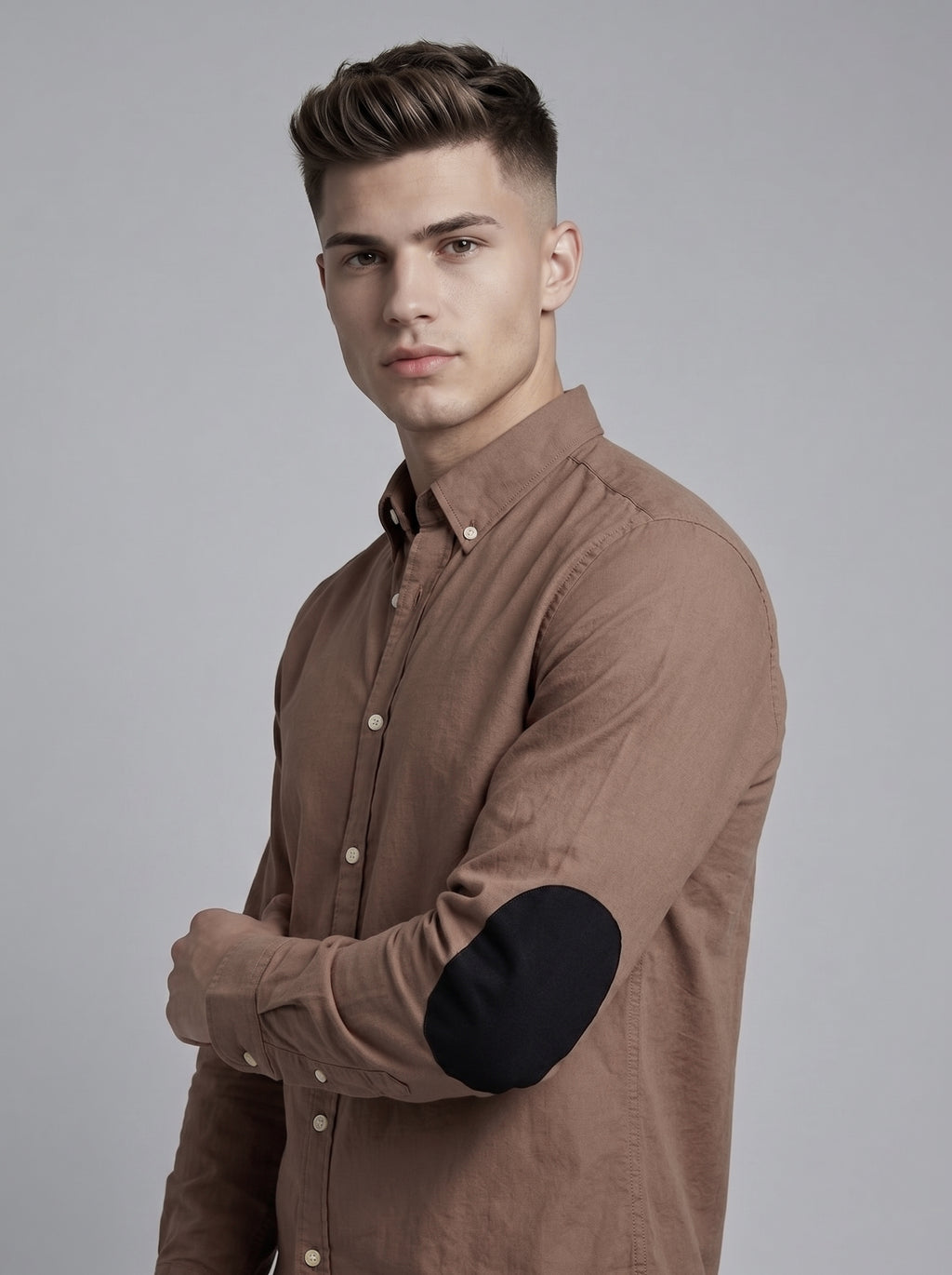 Snipes elbow patch shirt featuring a casual design with contrasting patches on the elbows, displayed on a neutral background.
