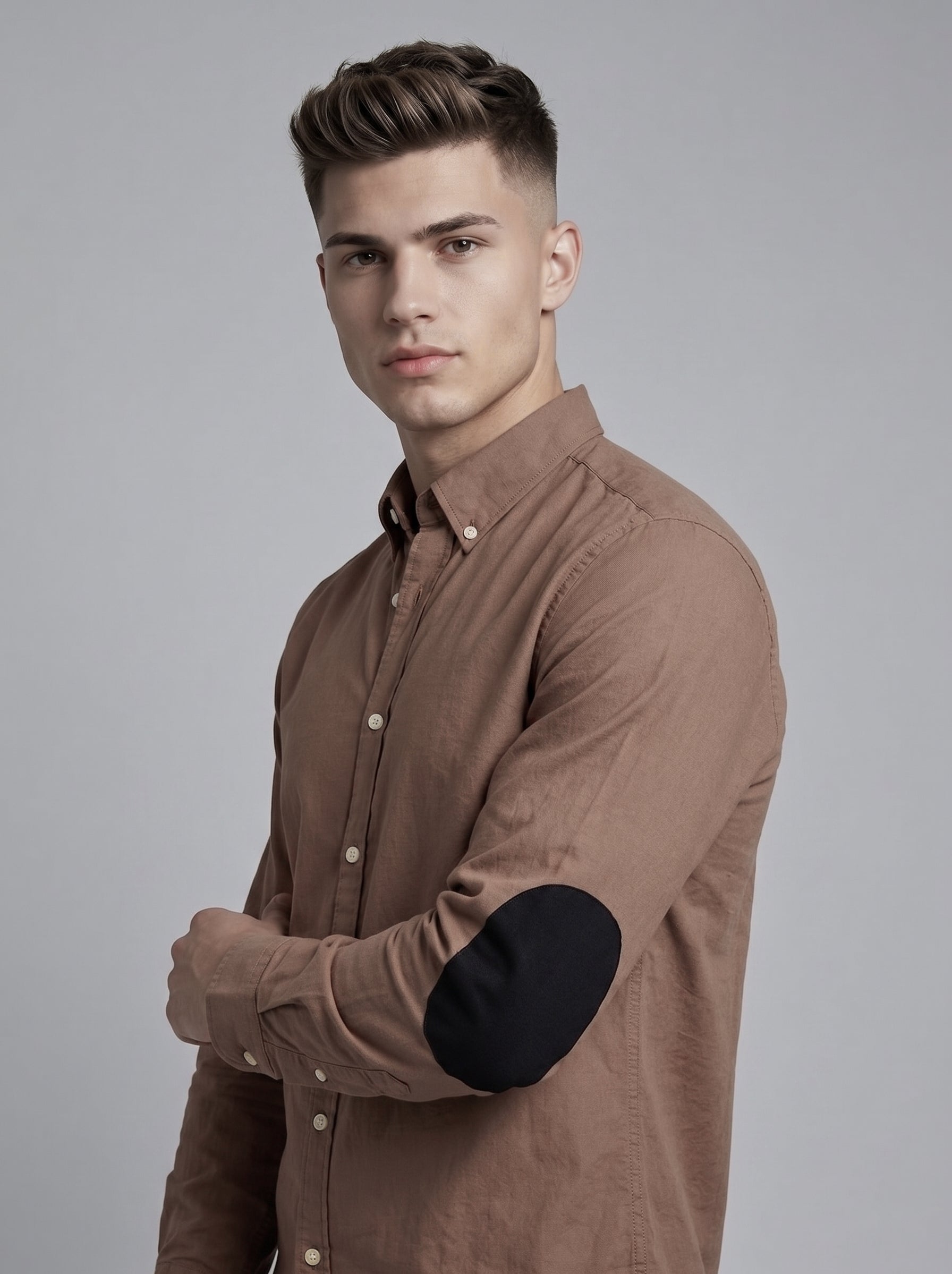 Snipes elbow patch shirt featuring a casual design with contrasting patches on the elbows, displayed on a neutral background.