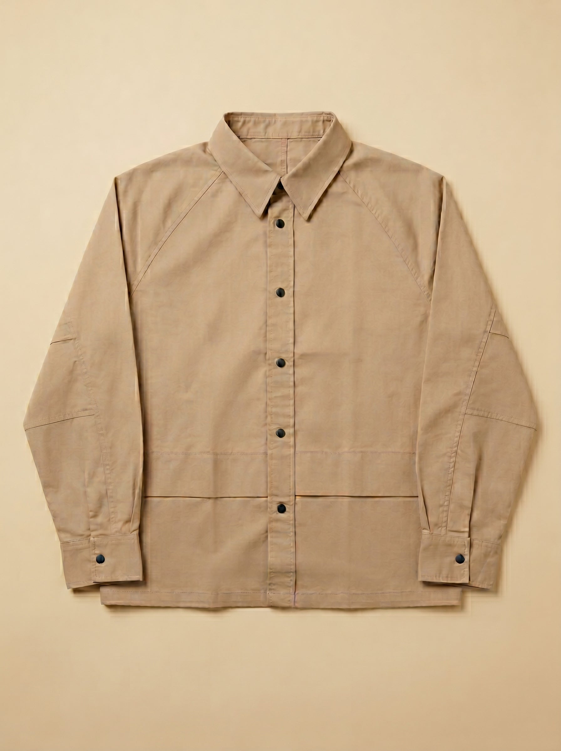 Snipes shacket featuring a stylish shirt design with a modern fit, displayed on a hanger.