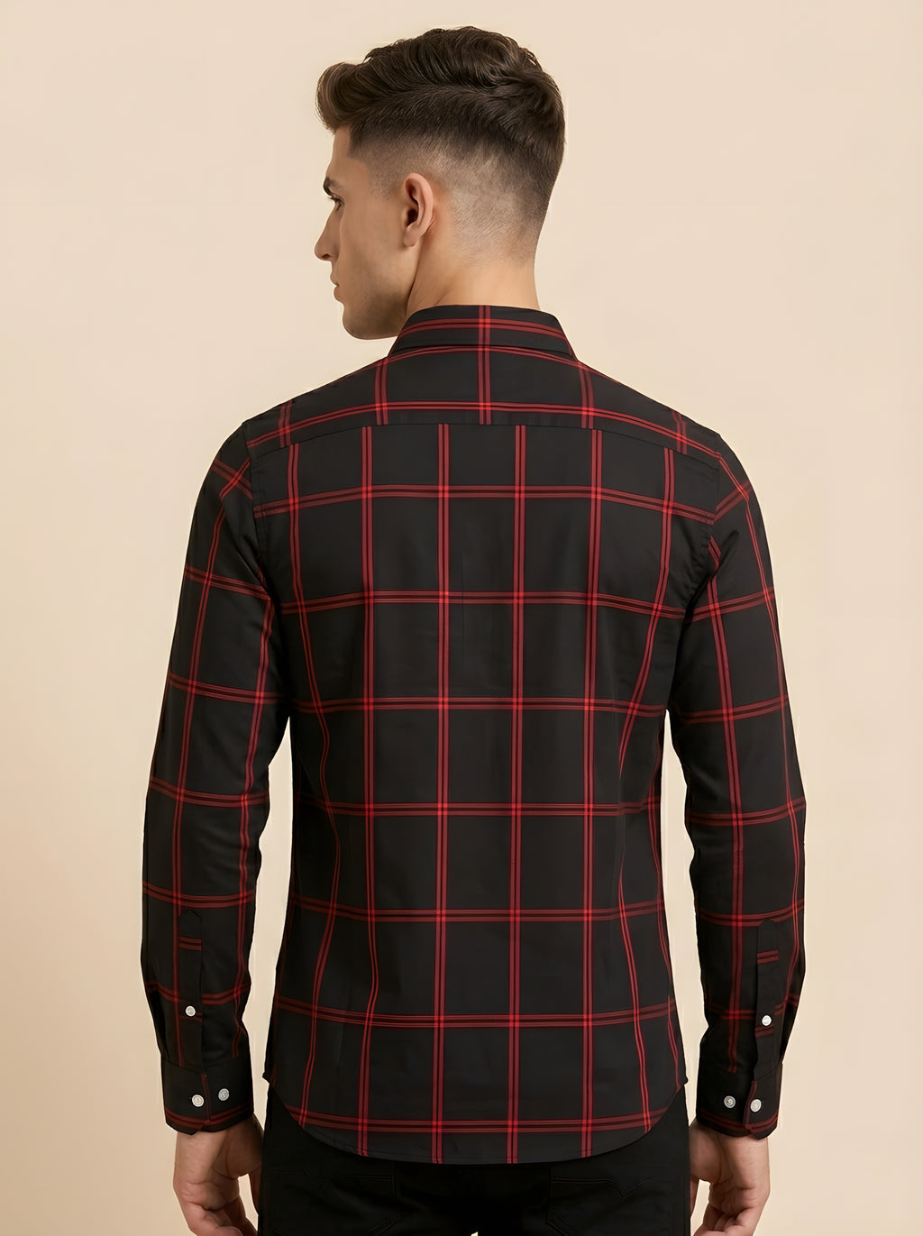 Snipes checked shirt featuring a classic plaid pattern, long sleeves, and button-up front, ideal for casual wear.