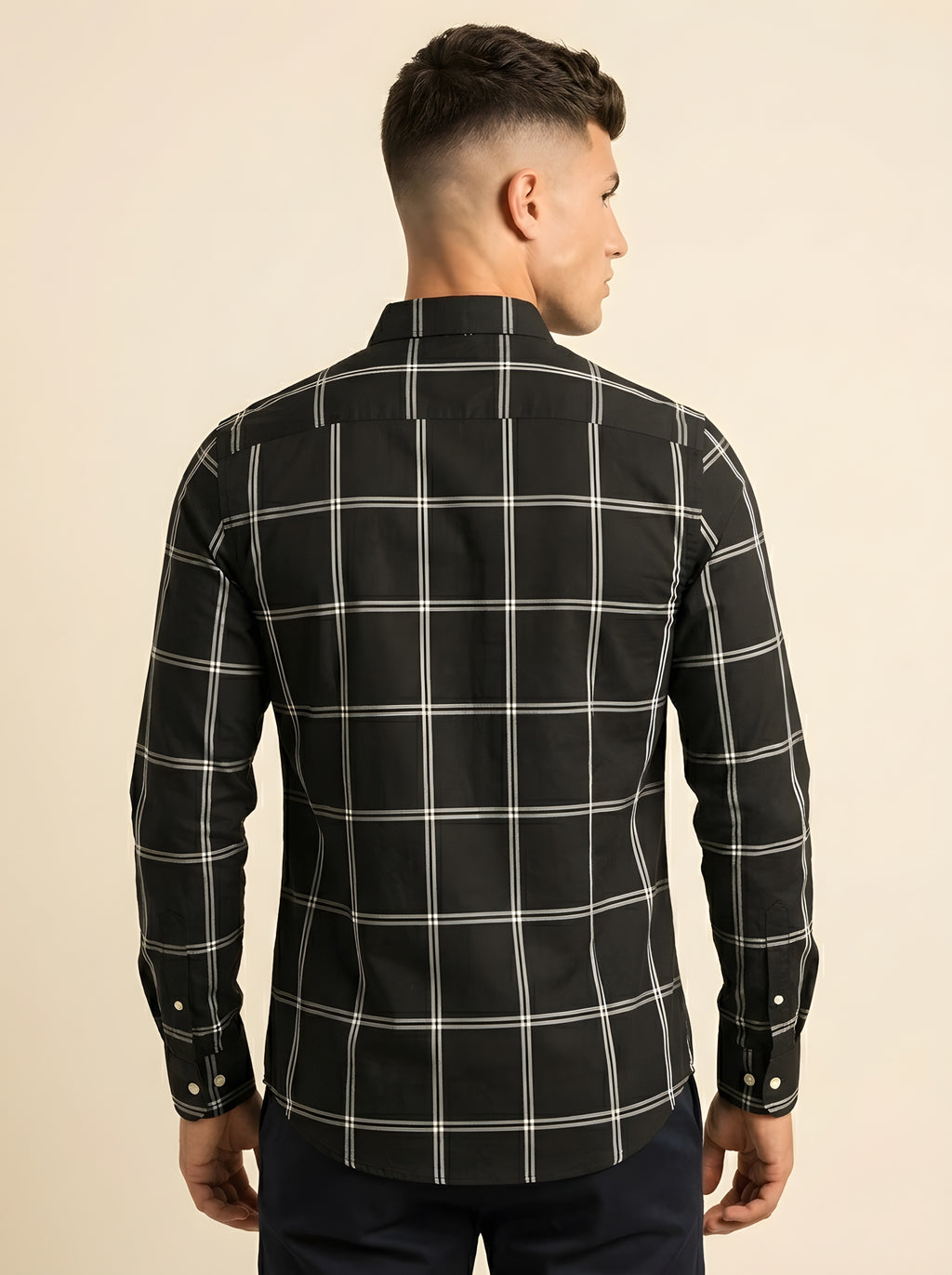 Snipes checked shirt featuring a classic plaid pattern, long sleeves, and button-up front displayed in the image.