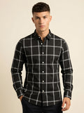 Snipes checked shirt with a classic pattern, featuring a button-up collar and long sleeves, displayed on a neutral background.