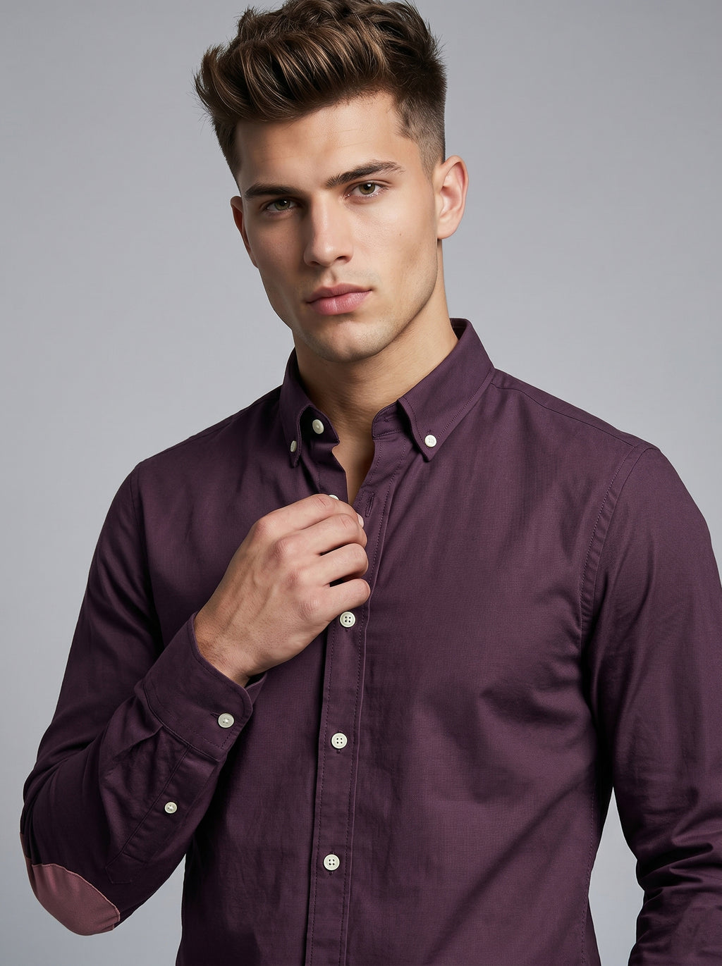 Snipes elbow patch shirt featuring a casual design with contrasting elbow patches and a button-up front.